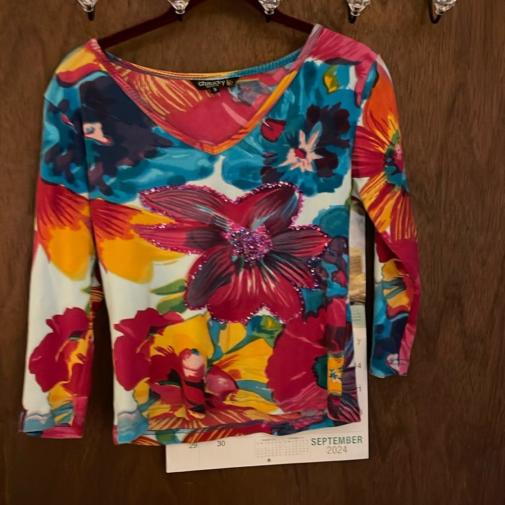 Used Chaudry three-quarter T-shirt size small with sequence in the front